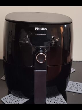 Philips Black and Silver Appliance Panel with Text Detail